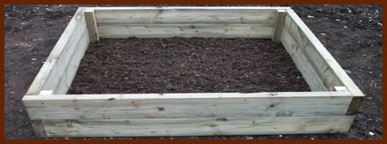 raised wooden vegetable bed